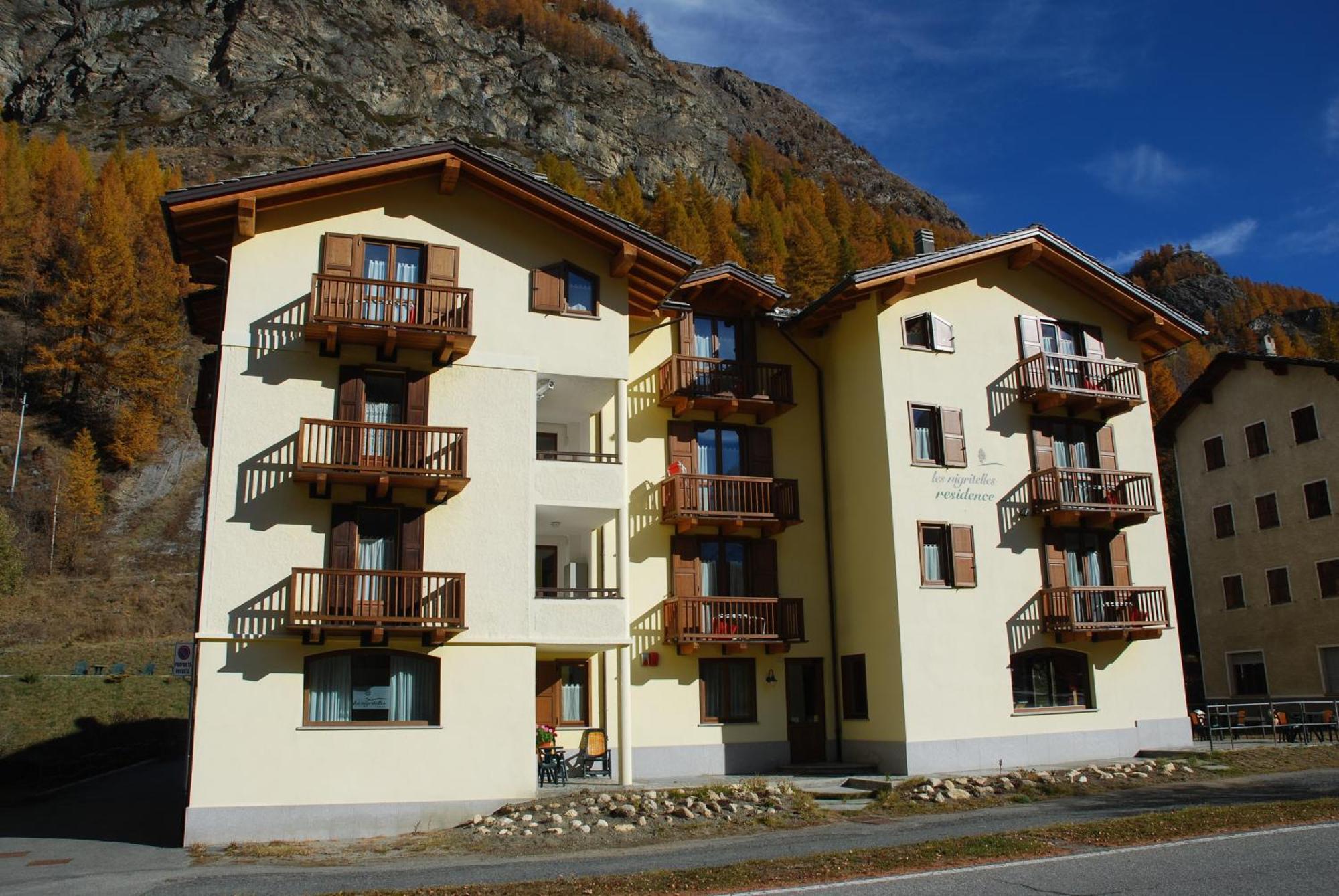 Residence Les Nigritelles Cogne Bagian luar foto